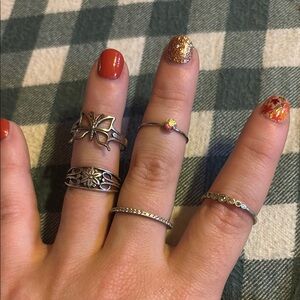 Elegant Silver Butterfly and Floral Ring Set